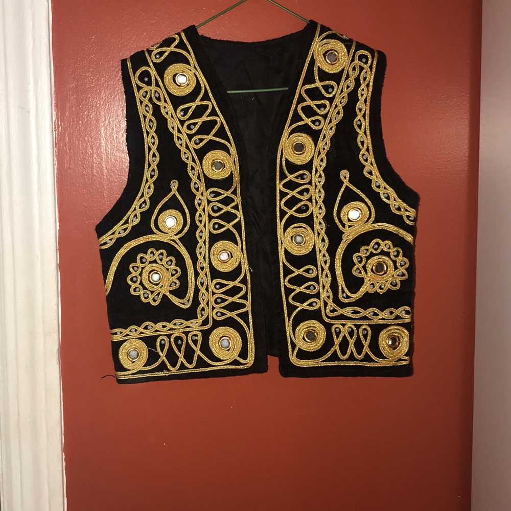 Ethnic vest with hat.